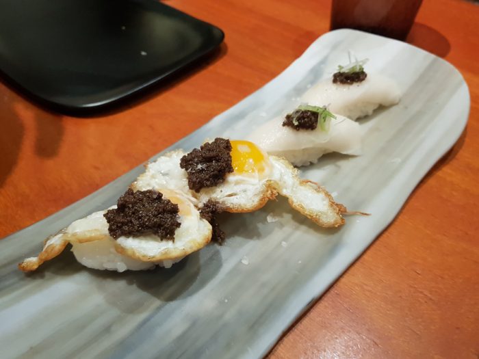 Quail egg and truffle Nigiri | Flat fish and caviar Nigiri