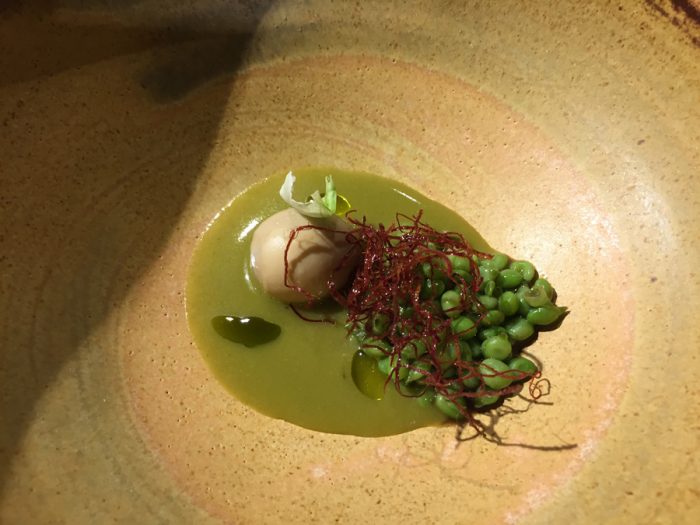 green mole with quail egg, peas and jerky
