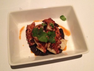 Pulpo with black beans and white polenta