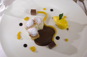 Buchteln with nougat sauce and passion fruit